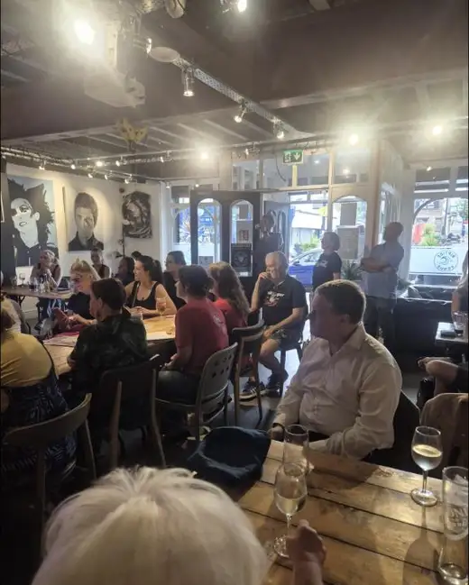 Members listening at a meet-up