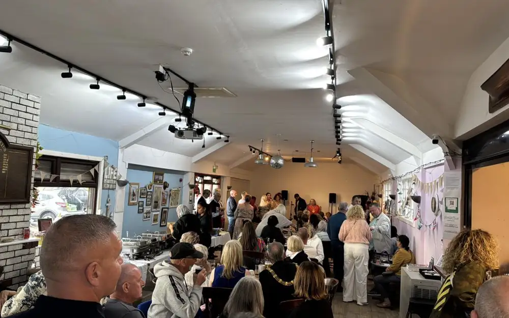 A full room at a monthly meeting
